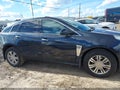 2015 Cadillac SRX — photo 13 of 17 | VIN 3GYFNBE36FS607476