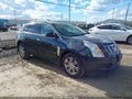 2015 Cadillac SRX — photo 1 of 17 | VIN 3GYFNBE36FS607476