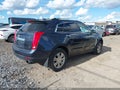 2015 Cadillac SRX — photo 4 of 17 | VIN 3GYFNBE36FS607476