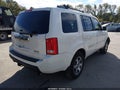2011 Honda Pilot — photo 4 of 19 | VIN 5FNYF4H93BB053971