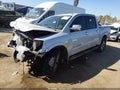 2011 Nissan Titan — photo 2 of 16 | VIN 1N6AA0ED7BN306905