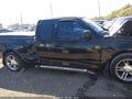 2000 Ford F-150 — photo 13 of 16 | VIN 2FTRX07L3YCA93958
