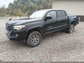 2018 Toyota Tacoma — photo 2 of 16 | VIN 3TMCZ5AN5JM136696
