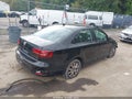 2015 Volkswagen Jetta — photo 4 of 15 | VIN 3VWD07AJ6FM324719