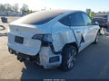 2022 Tesla Model Y — photo 4 of 17 | VIN 7SAYGDEE3NF408918