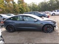2022 Tesla Model 3 — photo 13 of 16 | VIN 5YJ3E1EC6NF336140