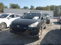 2012 Hyundai Tucson — photo 2 of 16 | VIN KM8JU3AC7CU346185