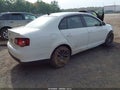2010 Volkswagen Jetta — photo 4 of 15 | VIN 3VWRA7AJ3AM018623