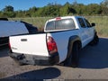 2014 Toyota Tacoma — photo 4 of 16 | VIN 5TFJX4CN0EX040219