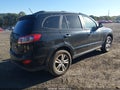 2012 Hyundai Santa Fe — photo 4 of 12 | VIN 5XYZKDAGXCG156890