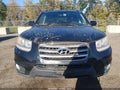 2012 Hyundai Santa Fe — photo 6 of 12 | VIN 5XYZKDAGXCG156890