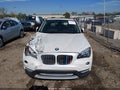 2013 BMW X1 — photo 12 of 16 | VIN WBAVL1C51DVR84405