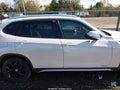 2013 BMW X1 — photo 13 of 16 | VIN WBAVL1C51DVR84405