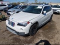 2013 BMW X1 — photo 2 of 16 | VIN WBAVL1C51DVR84405