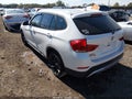 2013 BMW X1 — photo 3 of 16 | VIN WBAVL1C51DVR84405