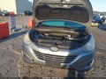 2011 Hyundai Tucson — photo 10 of 17 | VIN KM8JUCACXBU270086