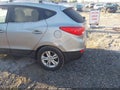 2011 Hyundai Tucson — photo 17 of 17 | VIN KM8JUCACXBU270086