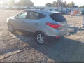 2011 Hyundai Tucson — photo 3 of 17 | VIN KM8JUCACXBU270086
