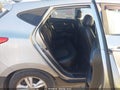 2011 Hyundai Tucson — photo 8 of 17 | VIN KM8JUCACXBU270086