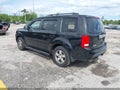 2011 Honda Pilot — photo 3 of 16 | VIN 5FNYF3H50BB017436