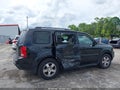 2011 Honda Pilot — photo 6 of 16 | VIN 5FNYF3H50BB017436