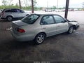 2002 Toyota Corolla — photo 4 of 16 | VIN 2T1BR12E42C585087