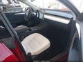 2023 Tesla Model Y — photo 5 of 20 | VIN 7SAYGDEE5PF899012
