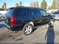 2007 Chevrolet Tahoe — photo 4 of 11 | VIN 1GNFK13097J241279
