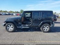 2011 Jeep Wrangler Unlimited — photo 15 of 17 | VIN 1J4BA5H16BL635087