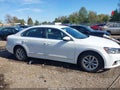 2016 Volkswagen Passat — photo 13 of 16 | VIN 1VWAT7A34GC033893
