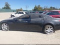 2014 Maserati Quattroporte — photo 14 of 16 | VIN ZAM56PPA1E1073127