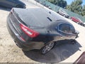 2014 Maserati Quattroporte — photo 4 of 16 | VIN ZAM56PPA1E1073127