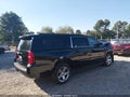2016 Chevrolet Suburban — photo 4 of 16 | VIN 1GNSCHKC1GR216281