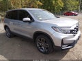 2022 Honda Passport — photo 1 of 16 | VIN 5FNYF8H52NB030822