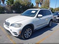 2013 BMW X5 — photo 2 of 11 | VIN 5UXZV4C57D0B20425