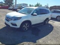 2018 Honda Pilot — photo 2 of 16 | VIN 5FNYF6H34JB009189