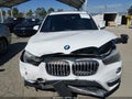 2017 BMW X1 — photo 11 of 15 | VIN WBXHU7C38HP925475