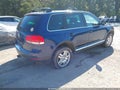 2004 Volkswagen Touareg — photo 4 of 11 | VIN WVGCM67L64D013723