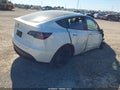 2023 Tesla Model Y — photo 4 of 14 | VIN 7SAYGDEE4PF687587