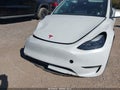 2023 Tesla Model Y — photo 6 of 14 | VIN 7SAYGDEE4PF687587