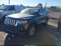 2011 Jeep Grand Cherokee — photo 2 of 12 | VIN 1J4RR6GGXBC558307
