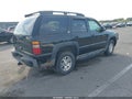2002 Chevrolet Tahoe — photo 4 of 12 | VIN 1GNEK13Z82R310743
