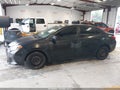 2016 Toyota Corolla — photo 14 of 17 | VIN 5YFBURHE4GP483929