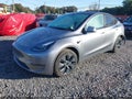 2024 Tesla Model Y — photo 2 of 20 | VIN 7SAYGAEE9RF109938
