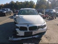 2014 BMW 3 Series — photo 12 of 16 | VIN WBA3B3G50ENR83974