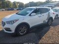 2017 Hyundai Santa Fe — photo 2 of 16 | VIN 5NMZT3LB3HH038685