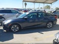 2016 Honda Civic — photo 14 of 16 | VIN 19XFC2F53GE238703
