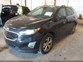 2018 Chevrolet Equinox — photo 2 of 16 | VIN 2GNAXTEX7J6311772