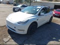 2021 Tesla Model Y — photo 2 of 19 | VIN 5YJYGDEEXMF259421