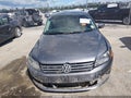 2015 Volkswagen Passat — photo 11 of 15 | VIN 1VWAT7A31FC091118